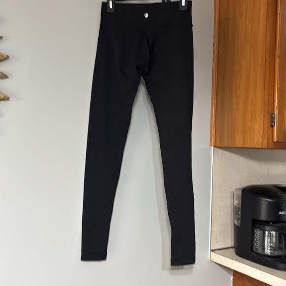 32.Lululemon Skinny Groove Pant in Black - Picture 6 of 7